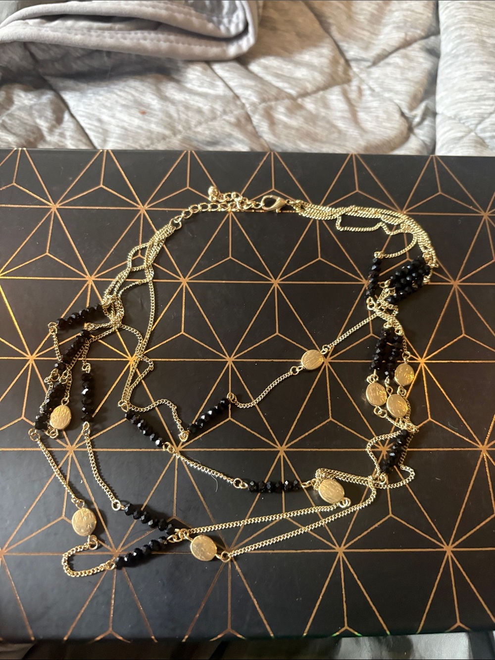 Gold Multi-Strand Necklace with Black Beads